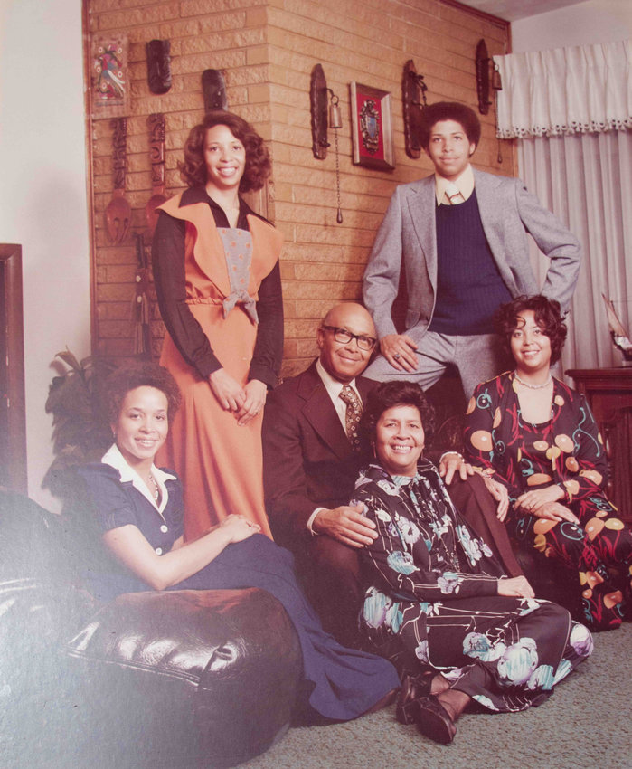 A photo circa late 1960s or early 1970s shows the Seymour family gathered for a portrait in their family home in Denver. In this photo, the siblings — Ida Daniel, Pat Rogers, JoEllen Greenwood and Winifred Semour, Jr. — were teens.